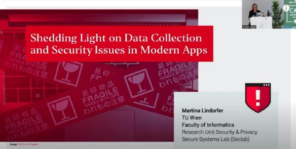 The image shows a screenshot from an online presentation. On the right side of the image, Martina Lindorfer is visible, presenting at a podium.