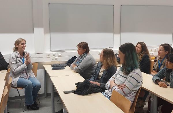 Photo of Ruzica Piskac and participants listening to her talk